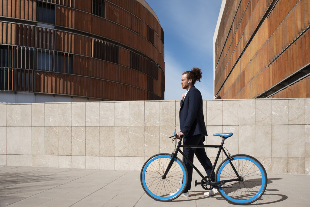 young-man-bicycle-going-work-full-shot