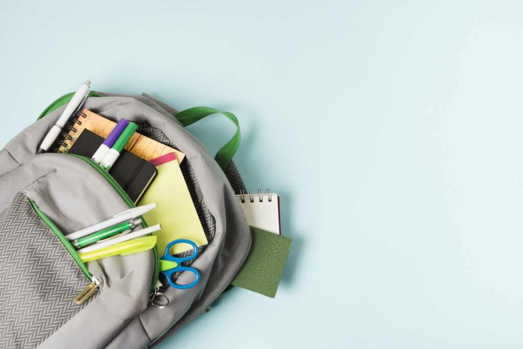 opened-backpack-with-school-supplies