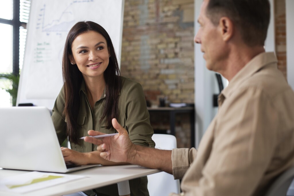 people-using-digital-device-while-meeting